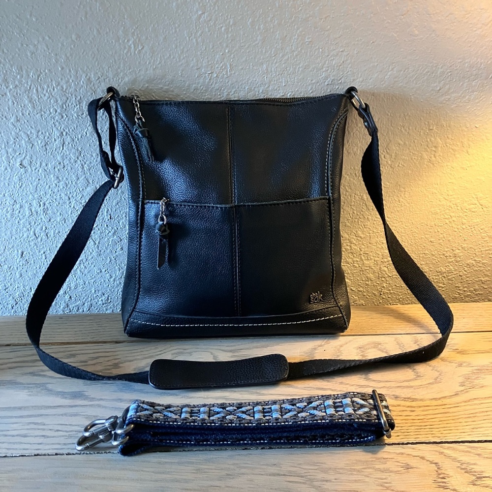 Black Messenger Bag with Adjustable Strap and Textured Leather